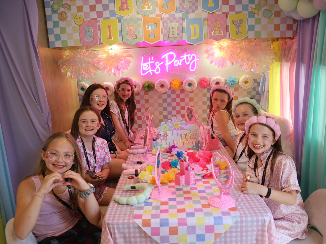 Girls at glam birthday party inside mobile trailer Omaha NE Besties Trailer Bash Co